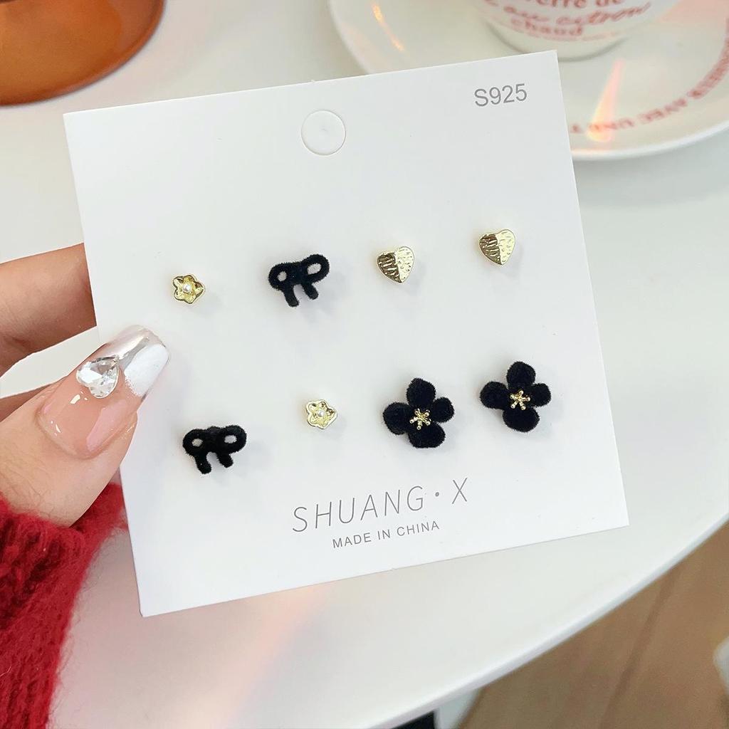 «Изысканные серьги-флок с бантом»: Элегантный и милый дизайн ниши для осени/зимы"