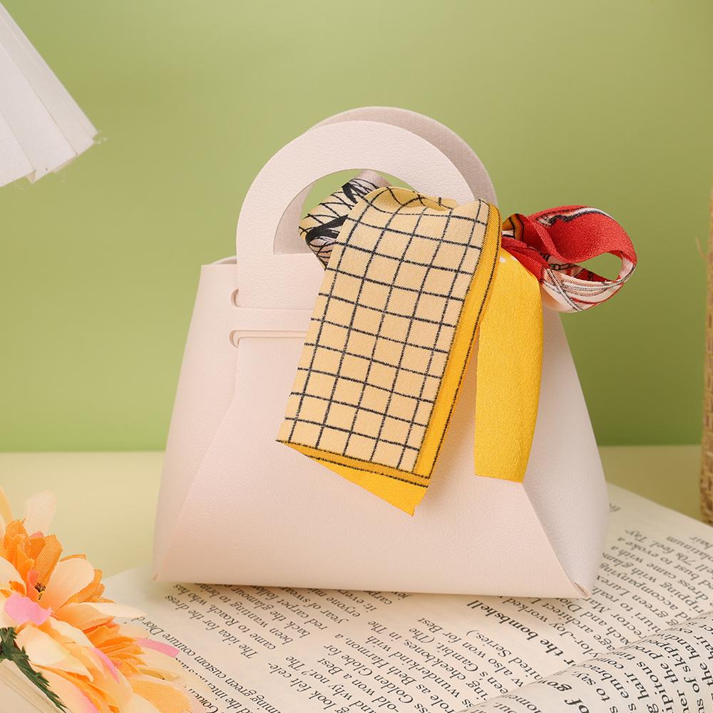 Роскошная кожаная мини-сумочка с бантом и лентой Подарочные пакеты Упаковочная коробка для конфет Распределительная сумка Свадебная вечеринка Подарочная коробка для конфет Кошелек