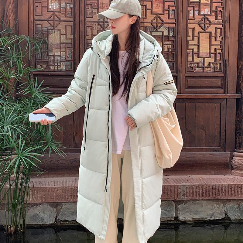 Женская пуховая куртка новая 2025 утолщенная и теплая корейская версия свободная длинная ниже колена хлопковая куртка зимняя стеганая куртка