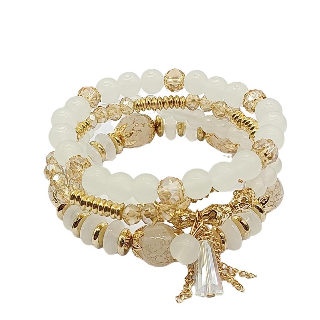 Шикарный женский браслет в стиле бохо с четырьмя слоями стеклянных бусин и кисточками