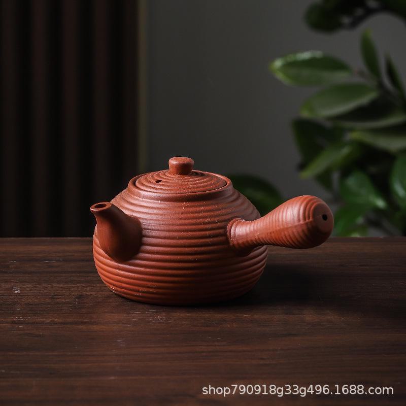 Керамический чайный сервиз «Кунг-фу»: Черный чайник с боковой ручкой и угольной горелкой для открытого огня.