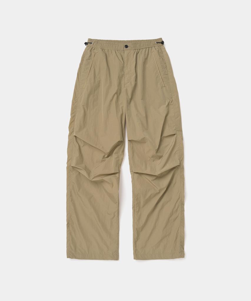 UNIFORM BRIDGE Nylon Parachute Pocket Pants Beige