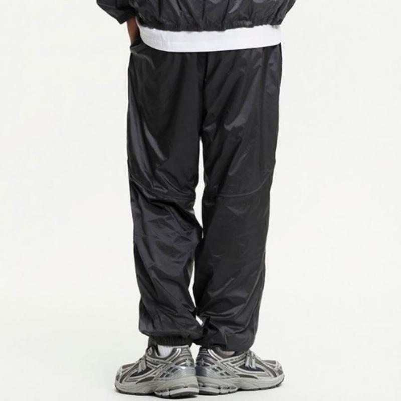 New Balance Nbnte22423 74 Runner S Jogger брюки для брюк