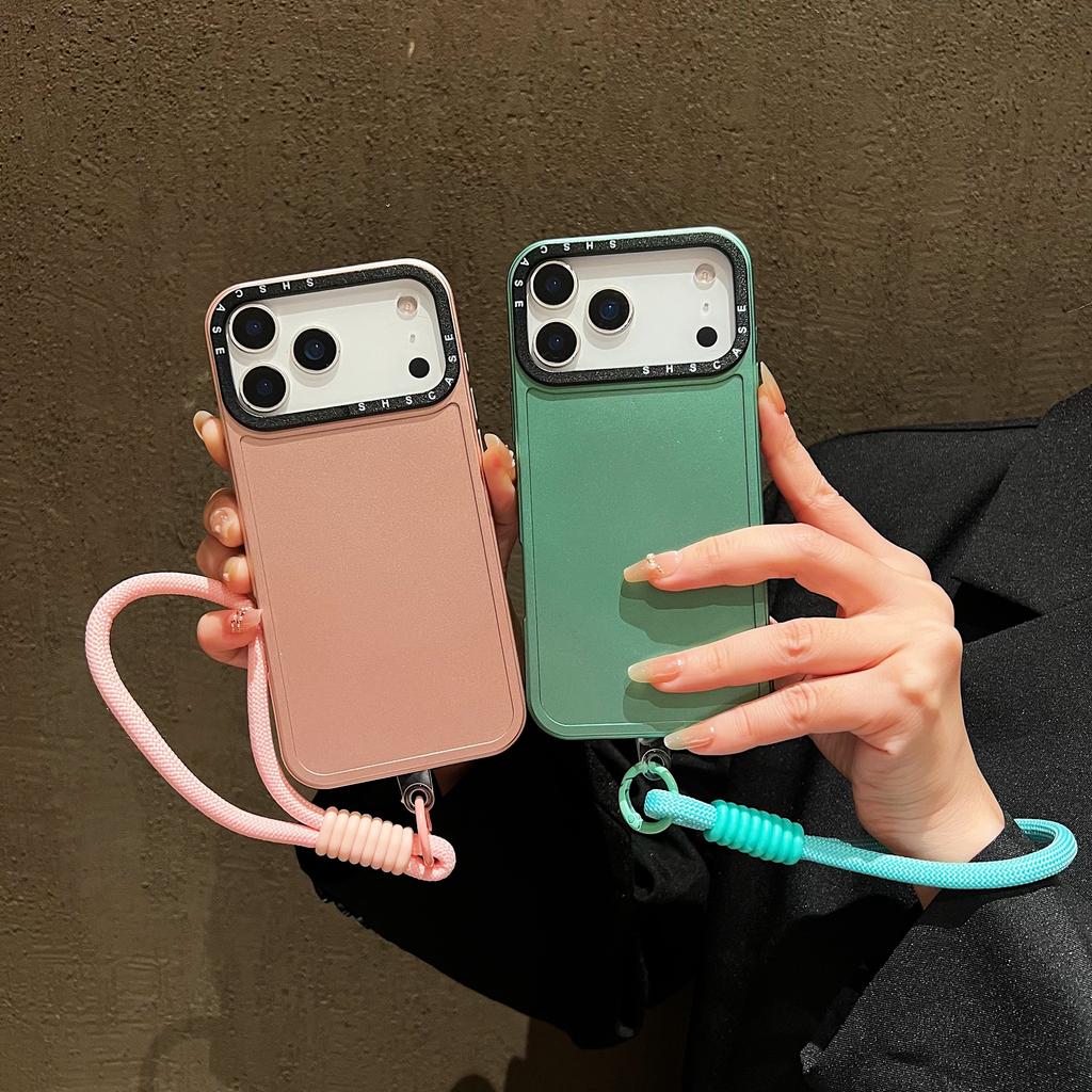 For iPhone 17 Pro Case Black Lens Frame Metal Paint Finish PC + TPU Phone Back Cover with Wrist Strap