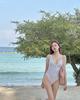 The source is a triangular one-piece sexy deep V small chest gathering girl 1011 new hot spring swimsuit