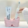 Visually Appealing Ceramic Toothbrush Holder with Bow Design Moisture-Resistant Bathroom Organizer, Freestanding Modern Vanity Decor for Countertop,