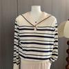 This Autumn and Winter Fashion Design Features A Simple Navy Neck Striped Long-sleeved Knitted Sweater and A Loose, Slimming Base Layer for Women
