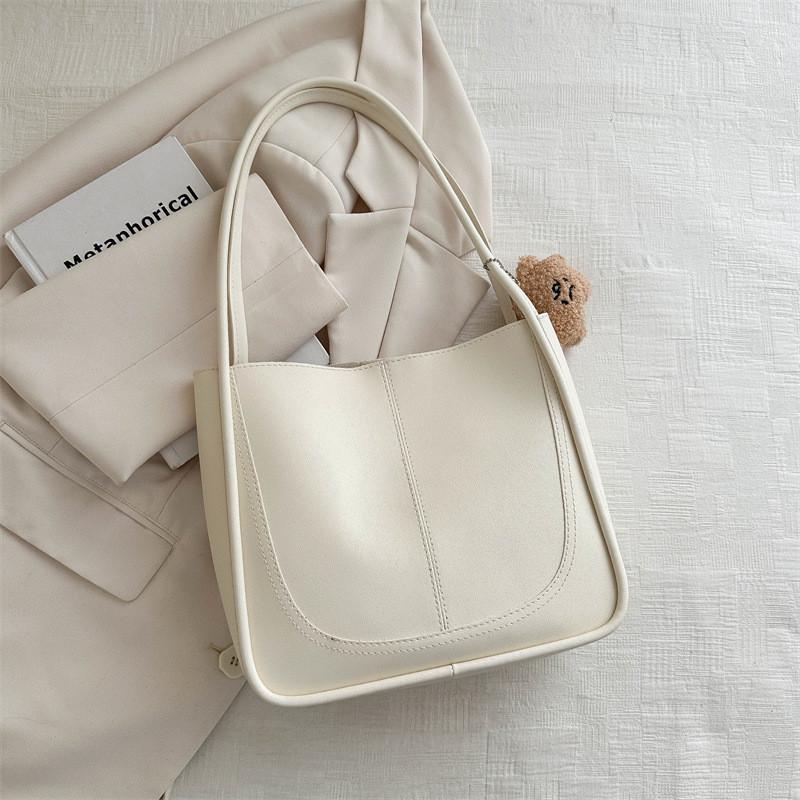 Модная женская сумка-тоут в стиле стрит-стайл Весна 2024 в черном, зеленом, розовом и белом цветах