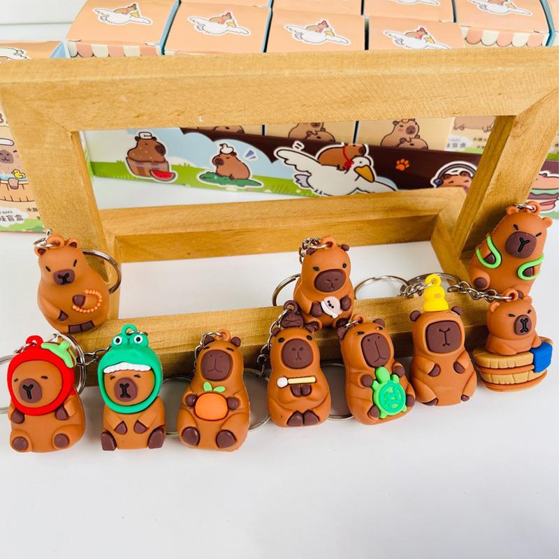 Автомобильный мультяшный брелок Капибара Случайный стиль Милый сопливый медведь Автомобильный брелок Подвеска Смешная кукла Капибара Декоративный автомобиль Креативные брелки