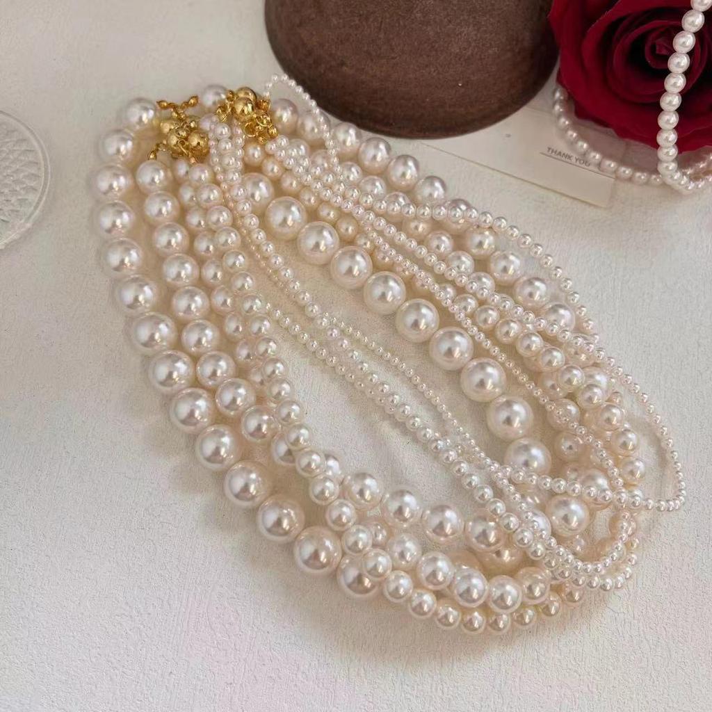 Elegant Magnetic Pearl Clavicle Necklace – High-End Versatile Sweater Chain for Women