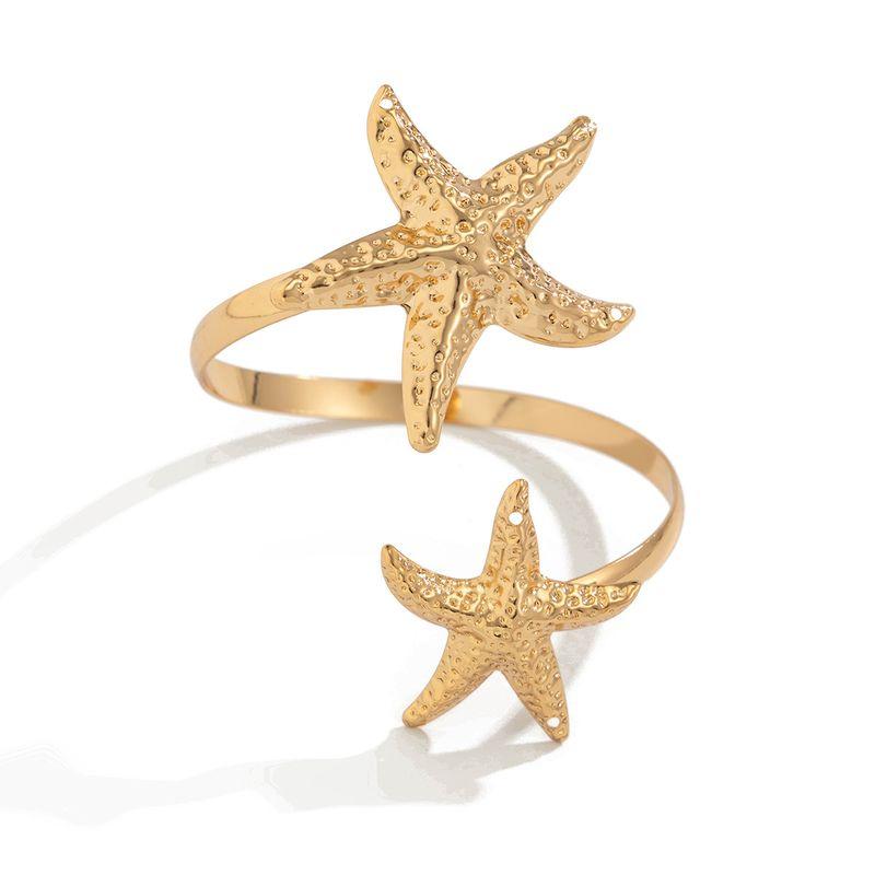 Metal Flower Starfish Arm Bracelet for Women 2026 Spring and Summer New European and American Fashion Influencer Travel Photo Shoot Matching Arm Band