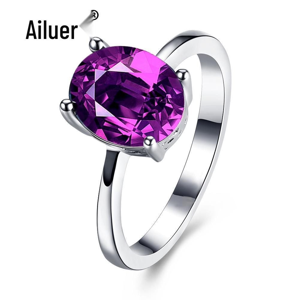 Женское кольцо-бестселлер из белого золота с овальным цирконом и кристаллами