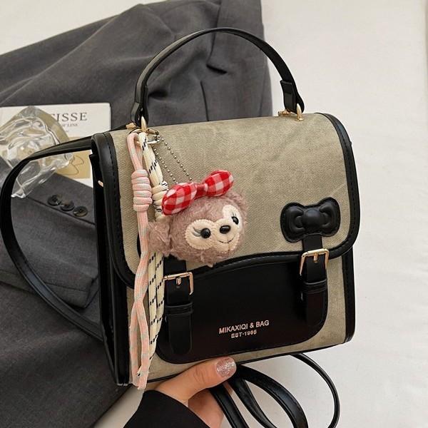 Casual retro women's backpack 2026 new exquisite versatile backpack travel bag mini schoolbag