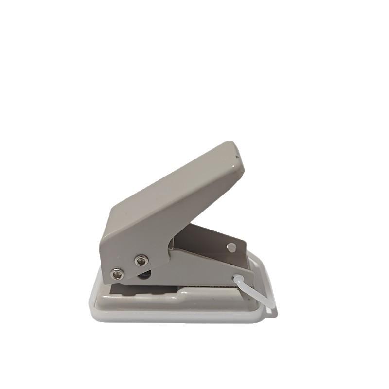 Компактный дырокол на одно отверстие для бумажных планеров, сделанных своими руками