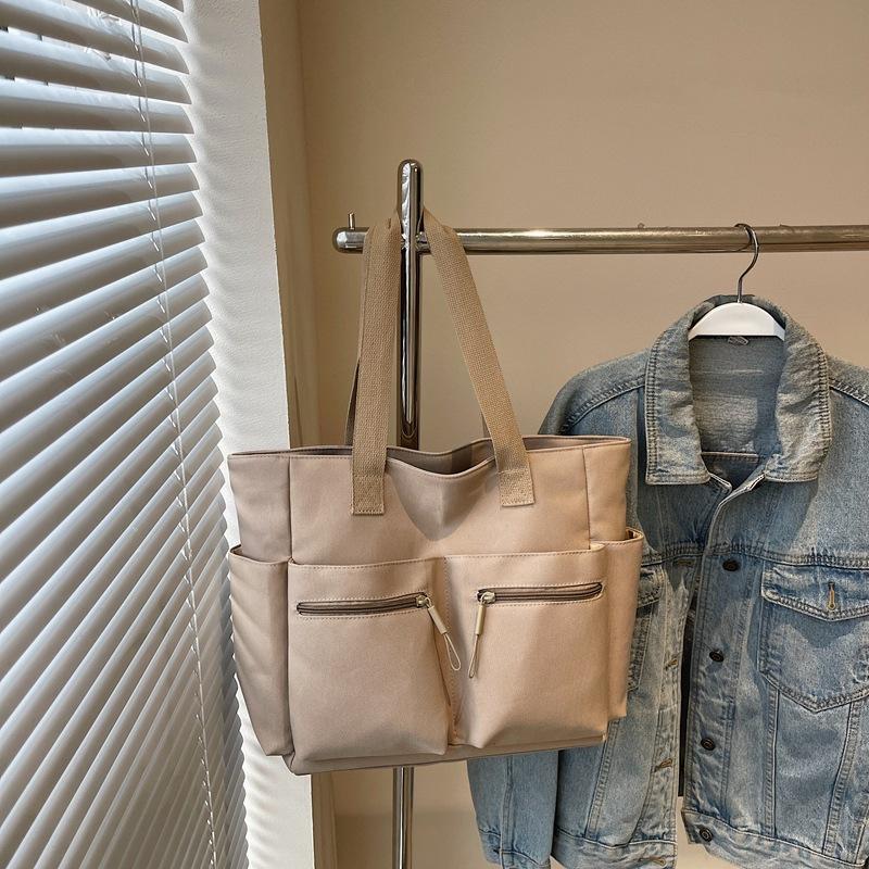 Простая повседневная сумка-тоут в зарубежном стиле, большой вместимости, персонализированная трендовая сумка подмышку, весенняя модная нишевая дизайнерская сумка через плечо