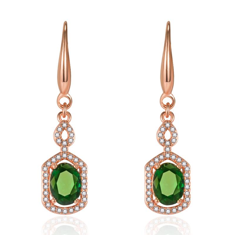 Популярные европейские и американские серьги с красными изумрудами