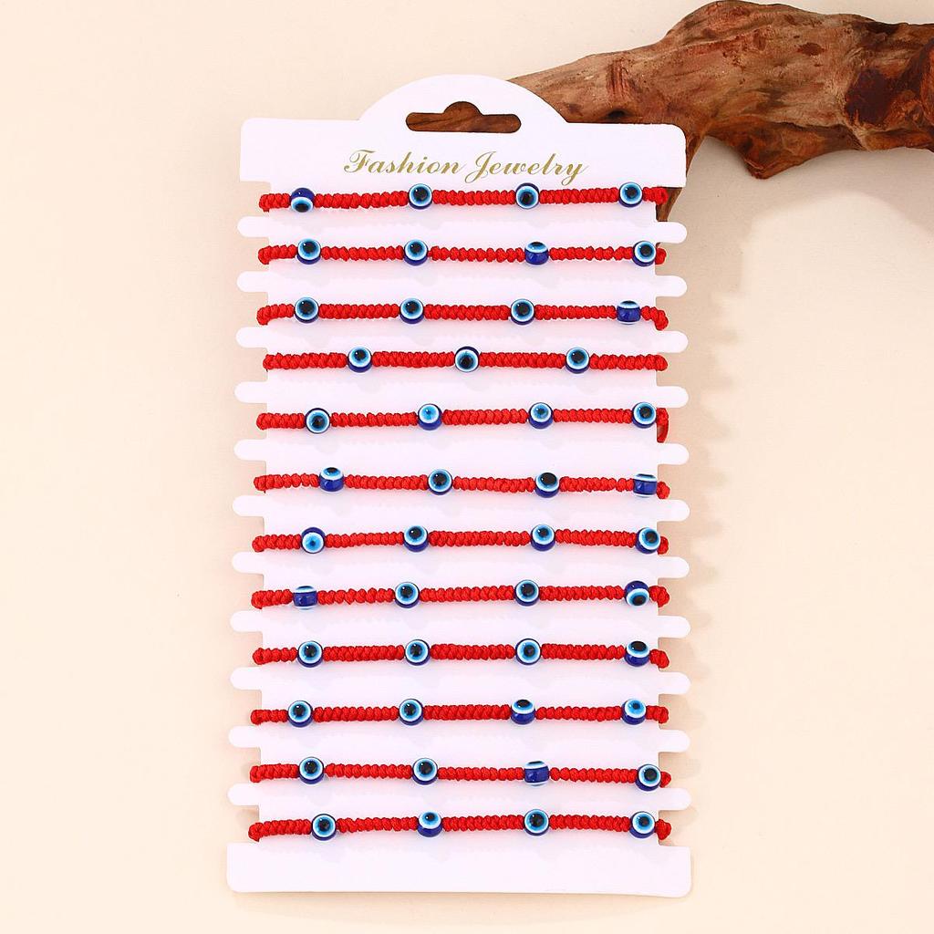 Набор браслетов из красной нити с синим сглазом - Ручная работа, плетеный дизайн