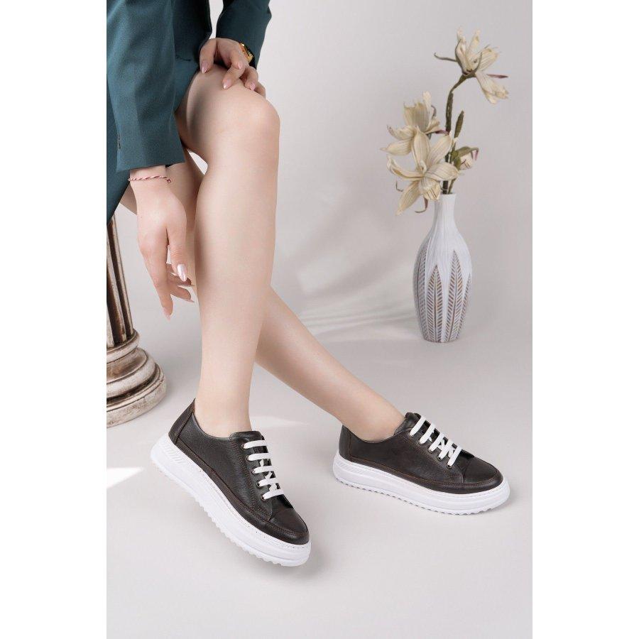 Женские кроссовки из натуральной кожи на толстой подошве