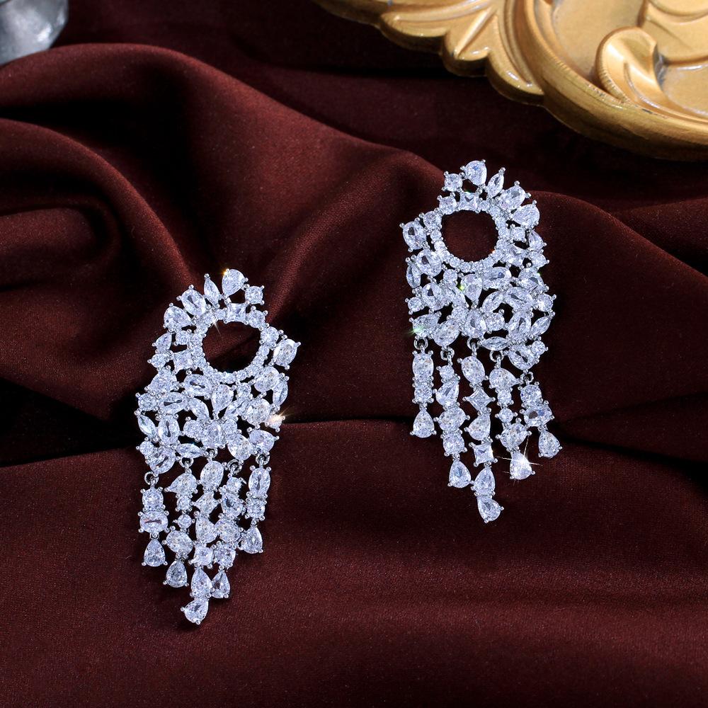 Серьги с цирконами и бахромой, демонстрирующие маленькое лицо, серьги высокого класса