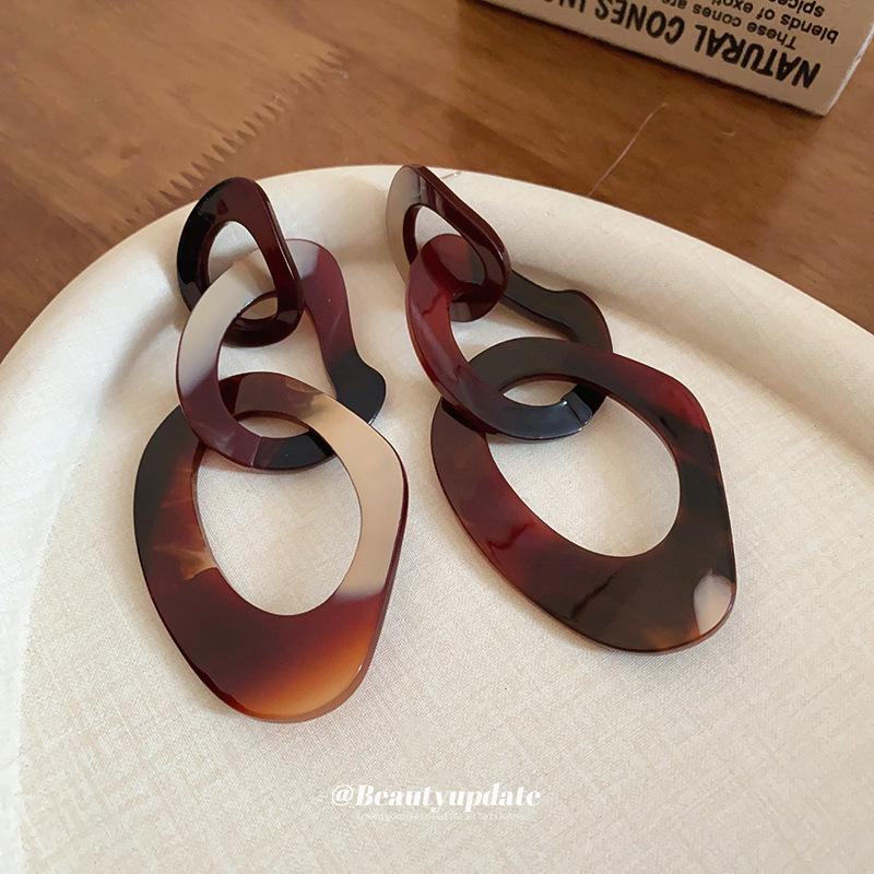 Серебряные серьги-цепочки с иглами из смолы и нестандартной формы — смелый европейский и американский модный дизайн.