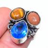 Кольцо из серебра 925 пробы с топазом Swiss Blue и тигровым глазом, размер 7,5 J8y17