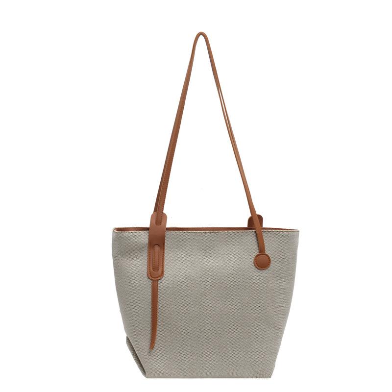 Повседневная сумка большой вместимости женская сумка 2024 года лето новая простая и модная сумка через плечо для поездок на работу простая женская сумка-тоут