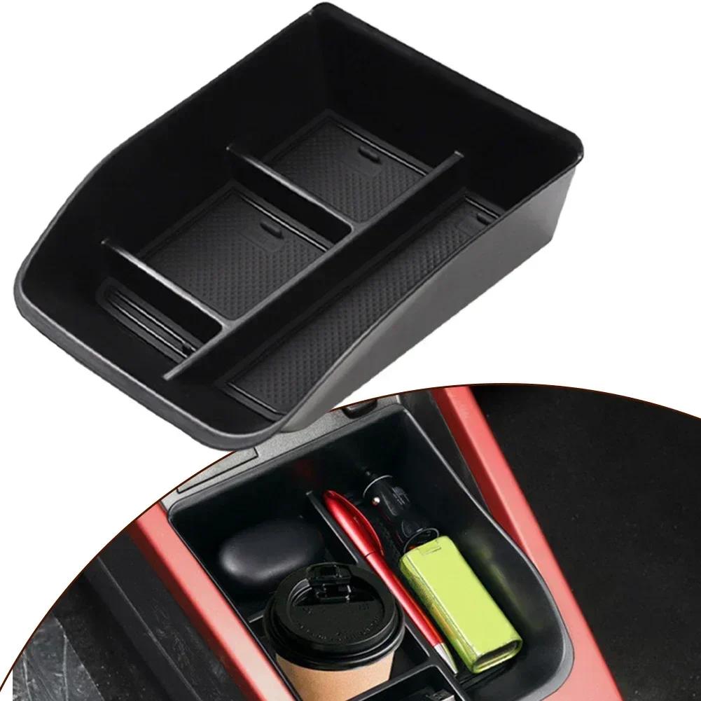 Используйте пространство эффективно с этим центральным органайзером для Dacia Spring. Легкая установка. Материал АБС. Черный