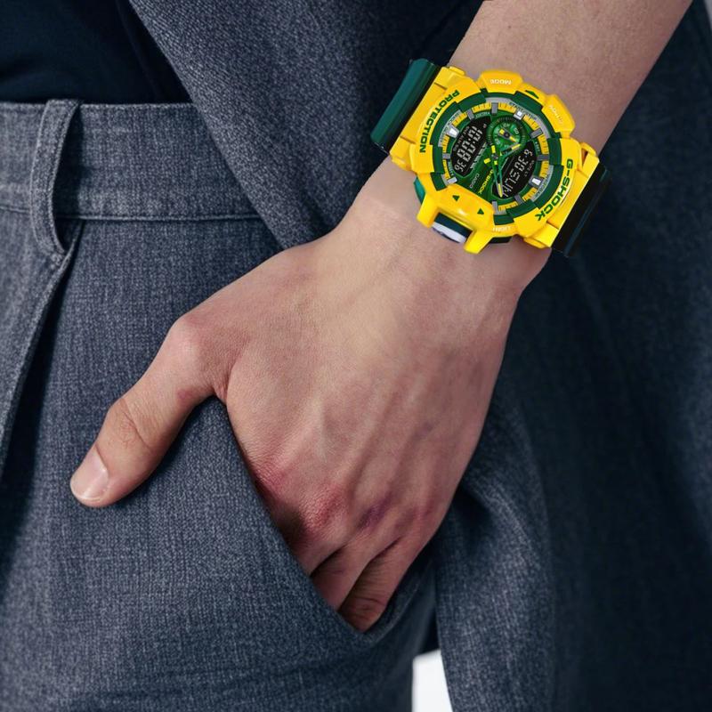 Casio Серия с двойным дисплеем LCD/Стрелки Яркие контрастные цвета Спортивные водонепроницаемые Бразильские цвета Интуитивное управление Вращающаяся заводная головка Большие GA-400CS-9APR