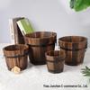 Carbonized Solid Wood Planter: Succulent & Flower Pot for Balcony or Home Decor, Antiseptic Wooden Retro Barrel Design.