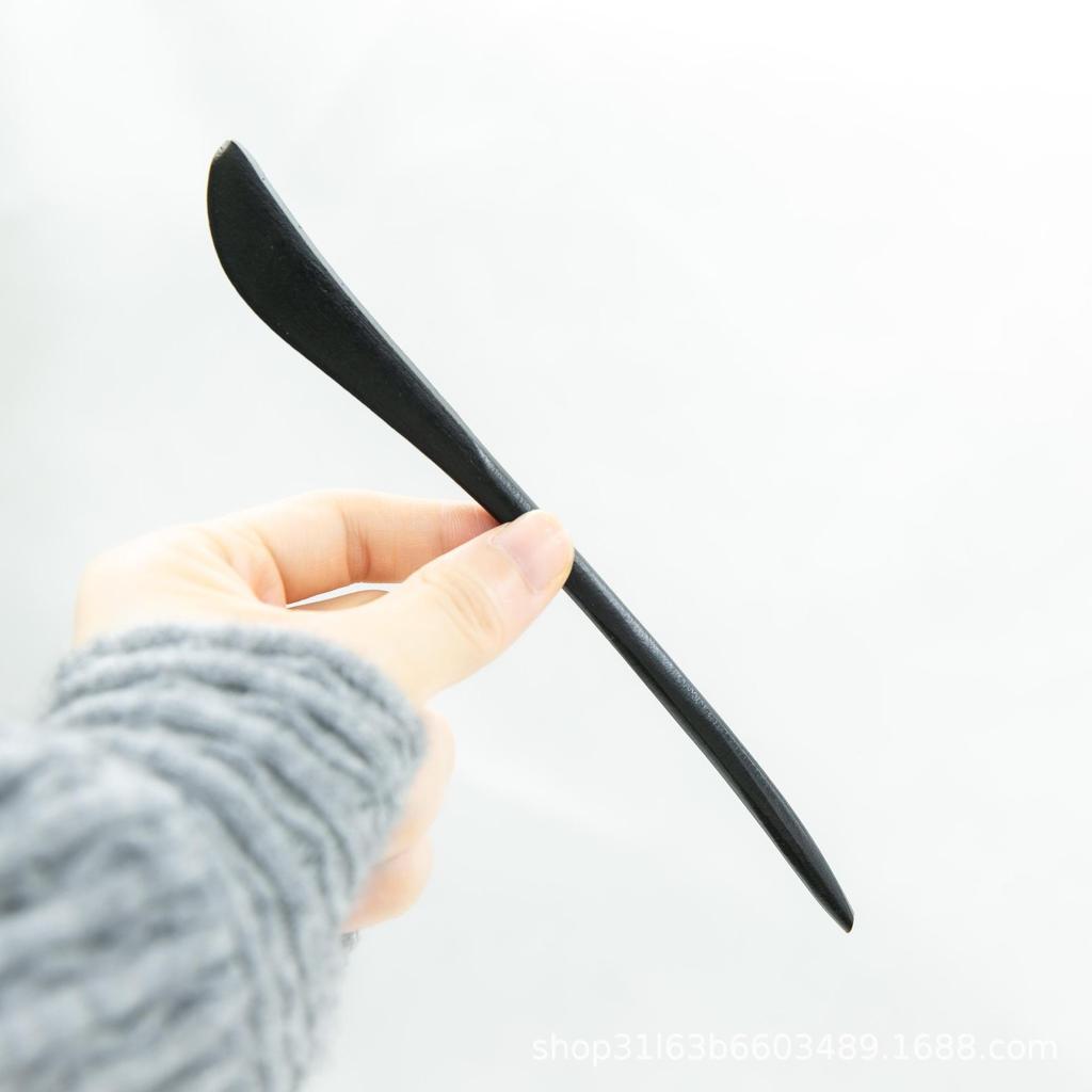 Элегантная шпилька из черного дерева: Современная простота в сочетании с древним китайским стилем