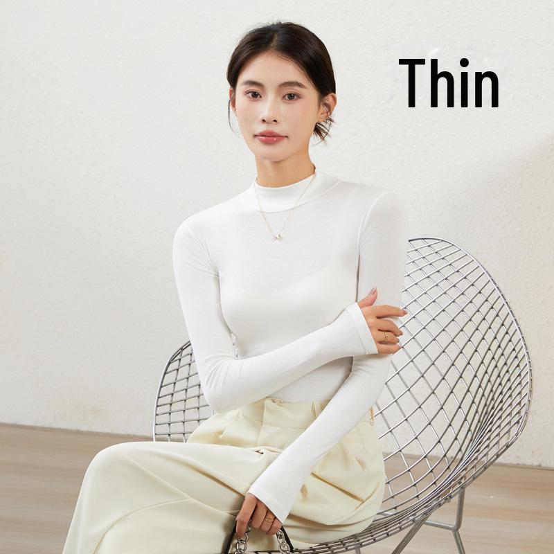 Женская облегающая рубашка с длинным рукавом и полуводолазкой — незаменимый предмет гардероба на осень/зиму в черном или белом цвете