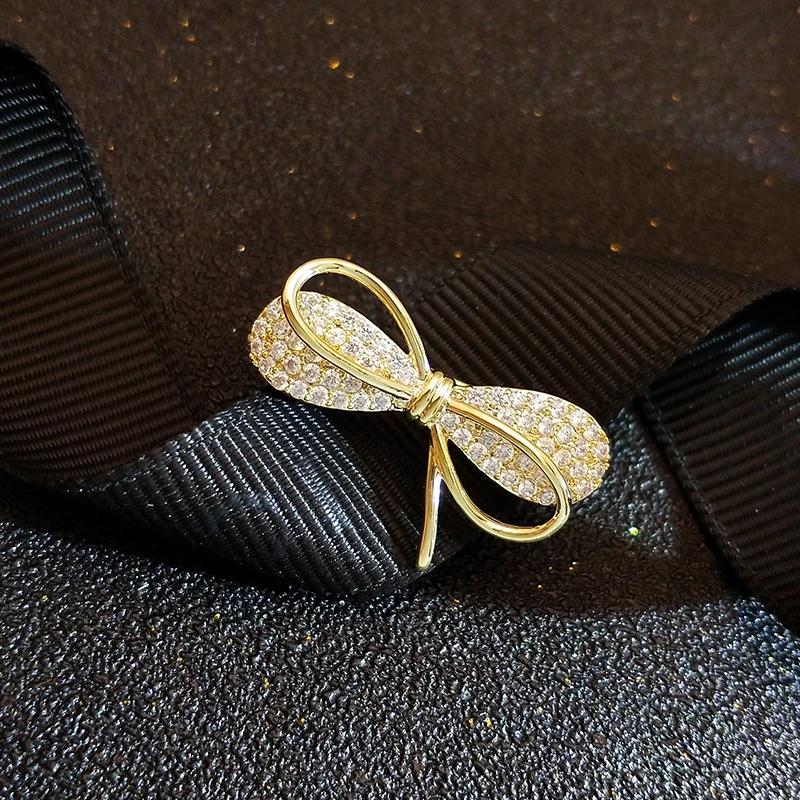 Trendy Buckle Bowknot Brooches Women Prevent Wardrobe Malfunction Brooch Buckle Three-dimensional Crystal Creative Corsage Accessories