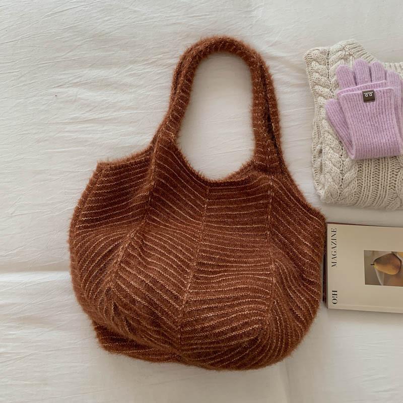 Korean lazy style large capacity retro solid color knitted tote bag niche fashion resort style woven armpit bag for women