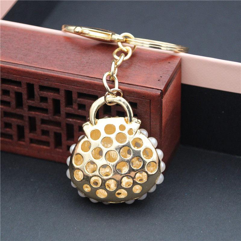 Модные брелоки для ключей Металлический шарм Жемчуг Брелок для сумки Кисточка Брелок для ключей Брелок для машины Сумка Брелок для женщин Ювелирные аксессуары Подарок