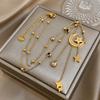 1Star and Moon Necklace Stainless steel chain with gold stars and synthetic zircon moon pendant, elegant party jewelry suitable for weddings, balls,