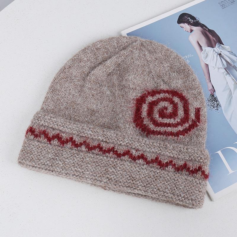 Source Fair Island wind vortex jacquard knitted wool hat autumn and winter new thermal ear protection headgear for men and women