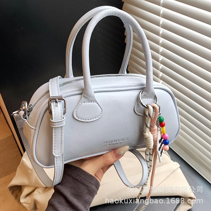 Премиальная сумка женская весна-лето 2025 новая популярная универсальная сумка-тоут сумка через плечо для通勤 сумка-мессенджер сумка-подушка