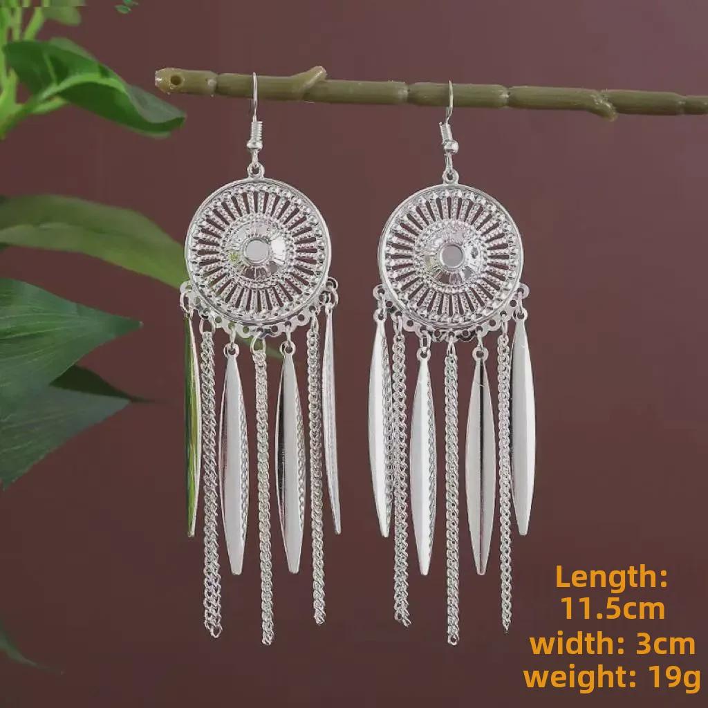 «Серебряные серьги Мяо с длинными кисточками — дизайн в этническом стиле с изображением фей»
