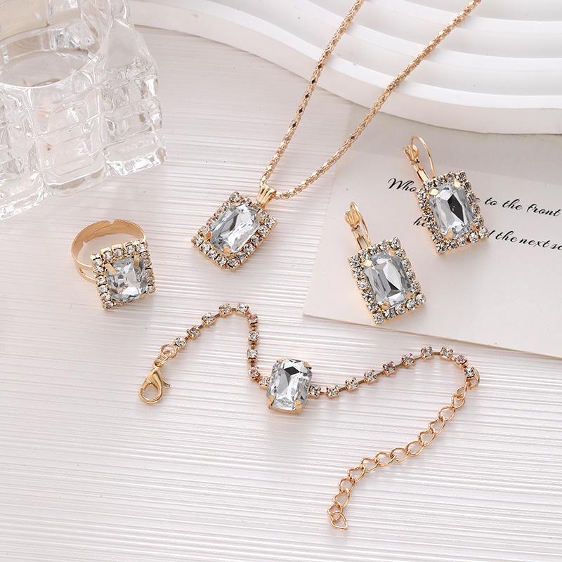 Women's Rhinestone Jewelry Set: Geometric Necklace, Ring, Bracelet & Earrings - 4-Piece Bridal Collection