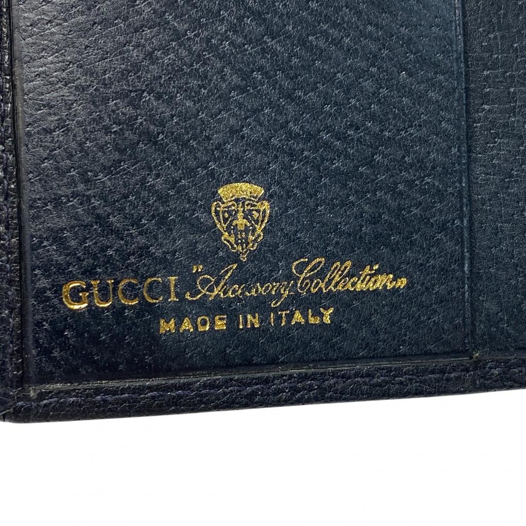 Подержанный кошелек GUCCI бифолд темно-синий кожа/ПВХ Женский