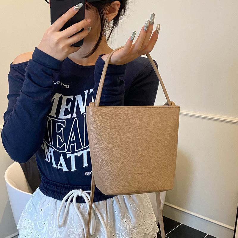 Простая и модная женская сумка-ведро для ношения в руке, новая коллекция весна-лето 2025, модная универсальная наплечная сумка, нишевая высококлассная женская сумка