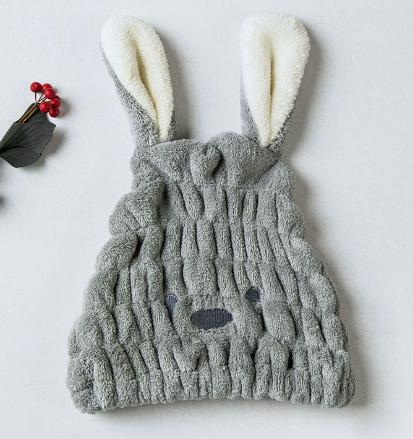 Cute cartoon bunny hair cap for absorbing water.