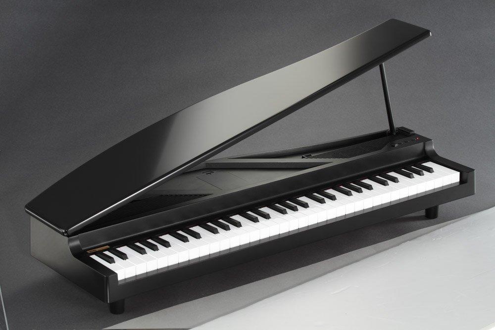 KORG MICROPIANO Микропианино Мини-клавиатура 61 клавиша черного цвета 61 демо-песня, автоматически воспроизводимые встроенные