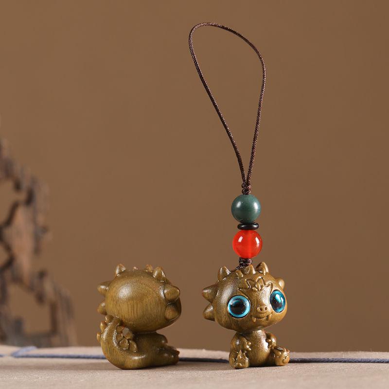 Twelve Zodiac Animal Charms Green Sandalwood Set: Rat, Ox, Tiger, Rabbit, Dragon, Snake, Horse, Sheep, Monkey, Rooster, Dog, Pig.