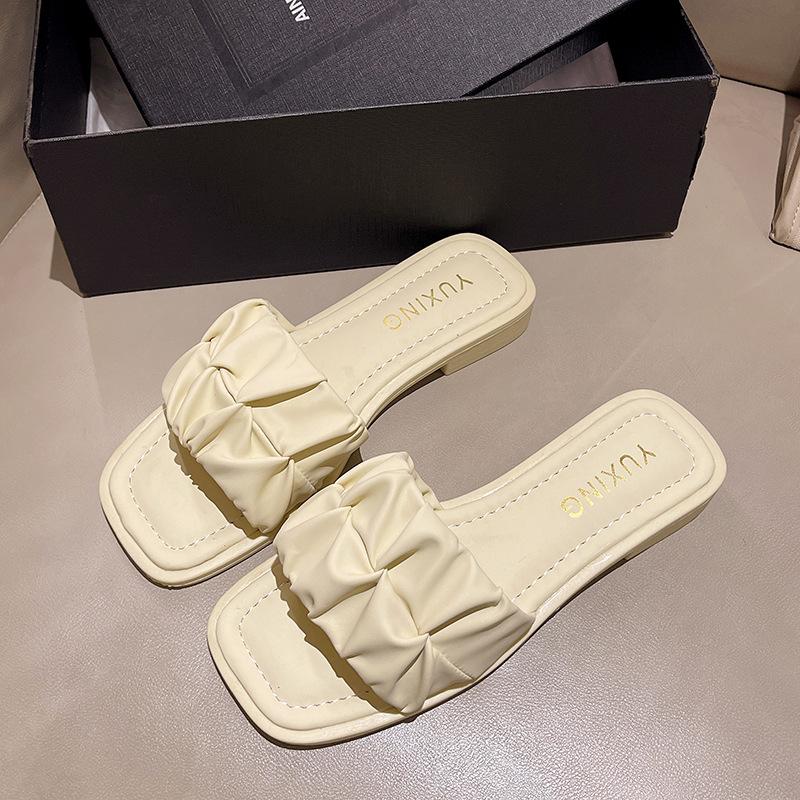 French flat-bottomed cool slippers women's summer wear fashion 2025 new skirt niche high-end beach slippers