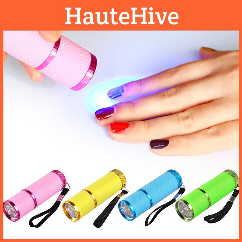 Компактная светодиодная лампа для сушки ногтей-фонарик с черным ремешком для удобной переноски и низким энергопотреблением