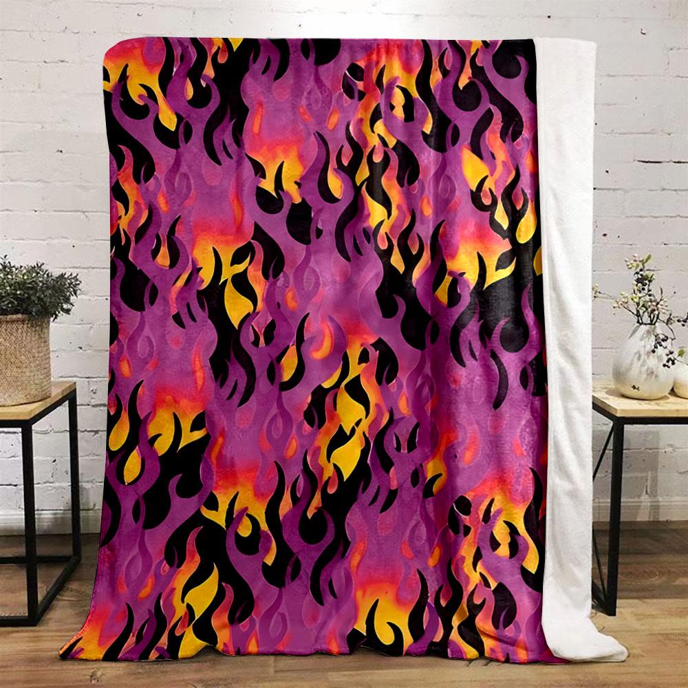Flame-like patterns with orange, yellow, and black on a purple background. for all seasons blanket lunch break throw gift