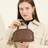 Женская сумка-боулинг Boston Bowling Bag из натуральной кожи растительного дубления Niche с одним плечом и через плечо