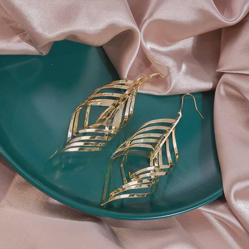 European & American Geometric Tassel Earrings - Long Leaf-Shaped Spiral Metal Design, Hollow & Exaggerated Style for Women