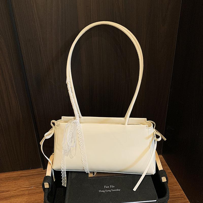 Корейская милая сумка подмышку для девочки 2025 новая модная сумка-подушка с бантом премиальная текстура универсальная сумка через плечо